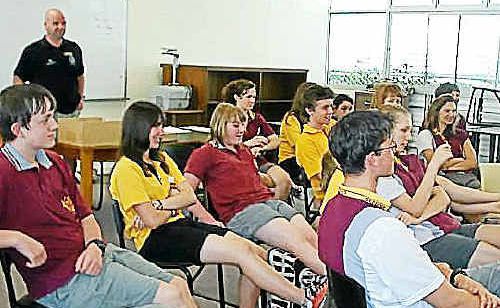 Students from Gympie High and James Nash discuss the problem. Students from Gympie High and James Nash discuss the problem.